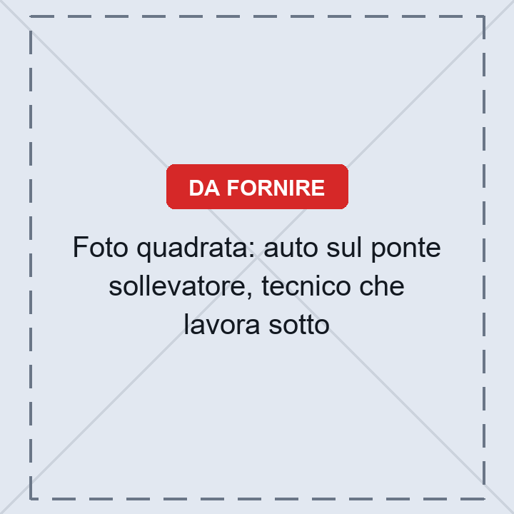 Auto sul ponte sollevatore nell'officina GMC di Bra